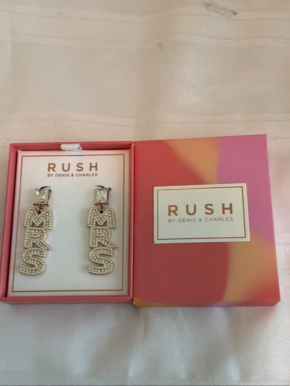 RUSH by Denis & Charles Gold Crystal Logo Drop Earrings-MRS